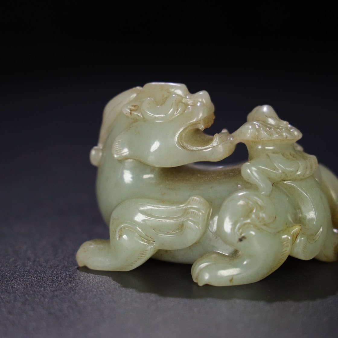 Chinese Natural Jade Carved Feathered Man and Beast