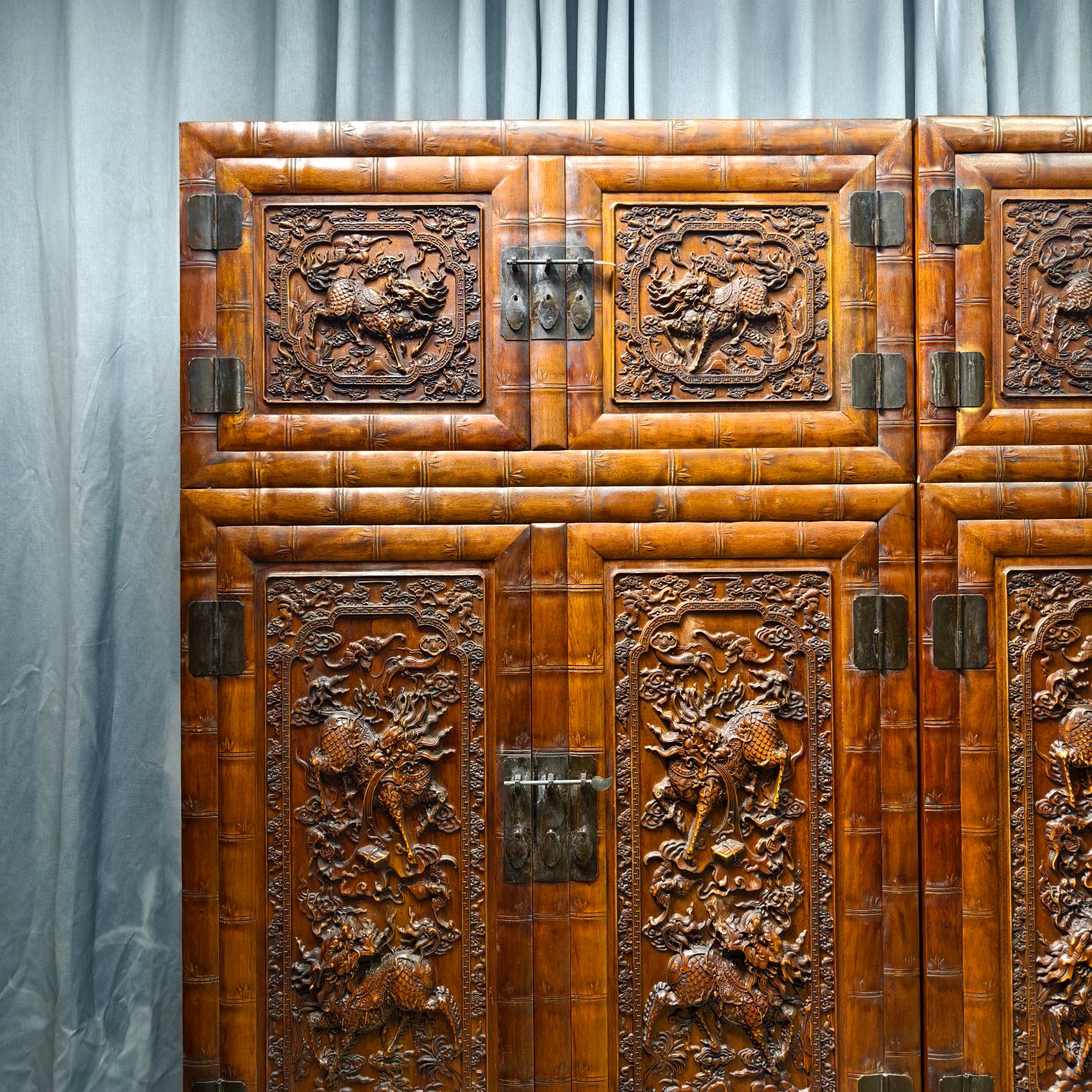 Qing Dynasty Rosewood high-relief cloud and unicorn pattern cabinet