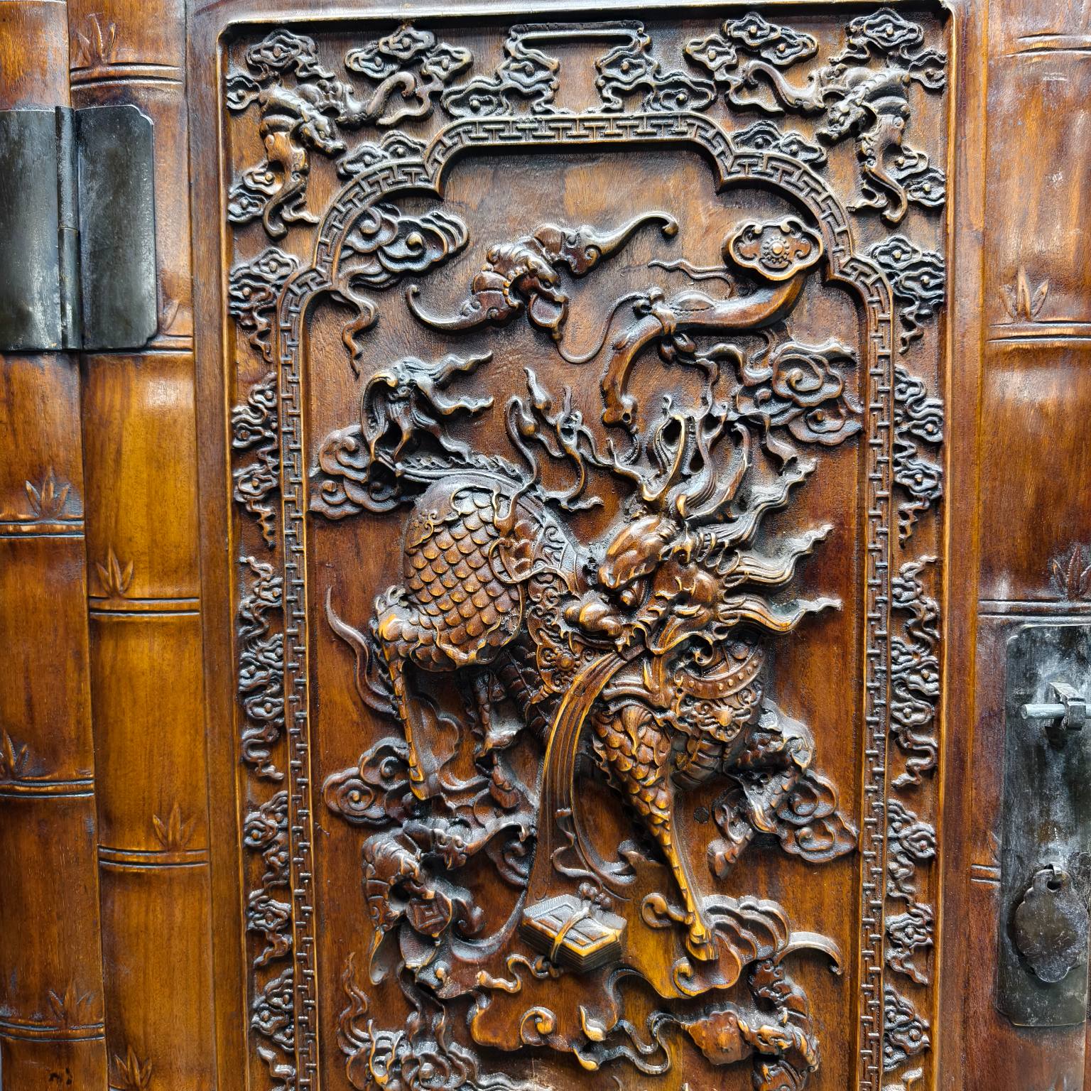 Qing Dynasty Rosewood high-relief cloud and unicorn pattern cabinet